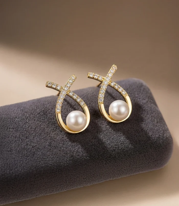 Hancini Criss-Cross Pearl & Zirconia Gold Stud Earrings 0A 0AHancini Criss-Cross Pearl & Zirconia Gold Stud Earrings 0A 0A_0002_ Hancini Criss-Cross Pearl & Zirconia Gold Stud Earrings 0A 0AHancini Criss-Cross Pearl & Zirconia Gold Stud Earrings 0A 0A_0002_